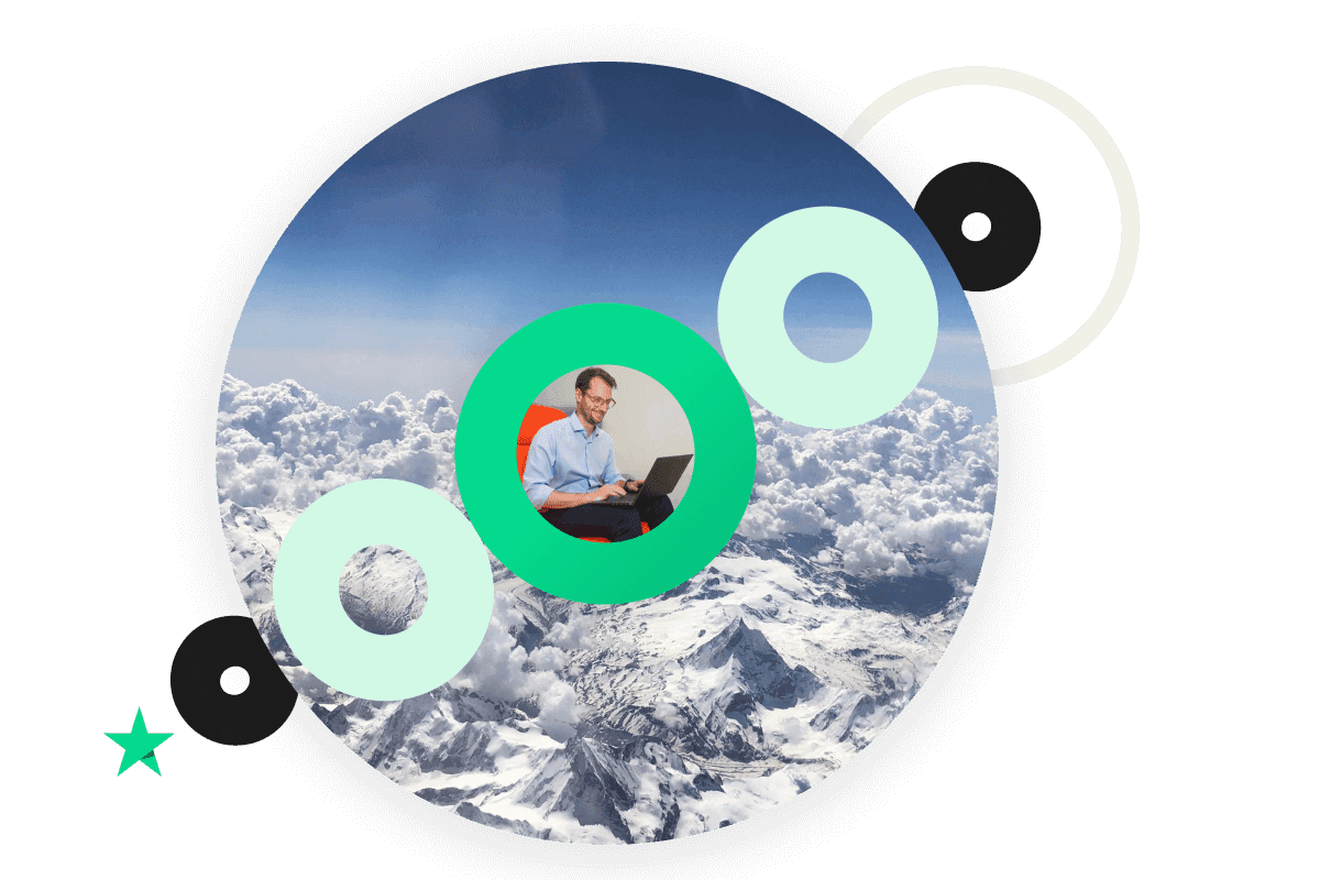 A photo of mountains and clouds contained in a Circle shape with smaller circles overlayed in a diagonal format